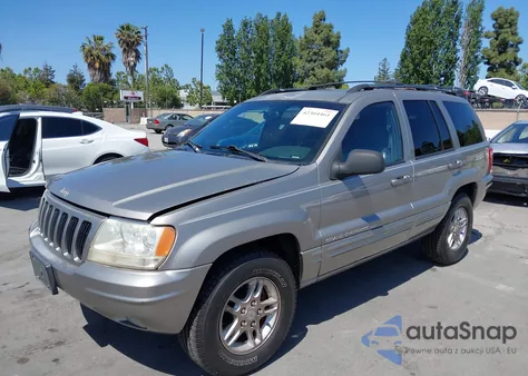 1999 Jeep Grand Cherokee Limited from USA, damaged, VIN 1J4GW68S9XC666797